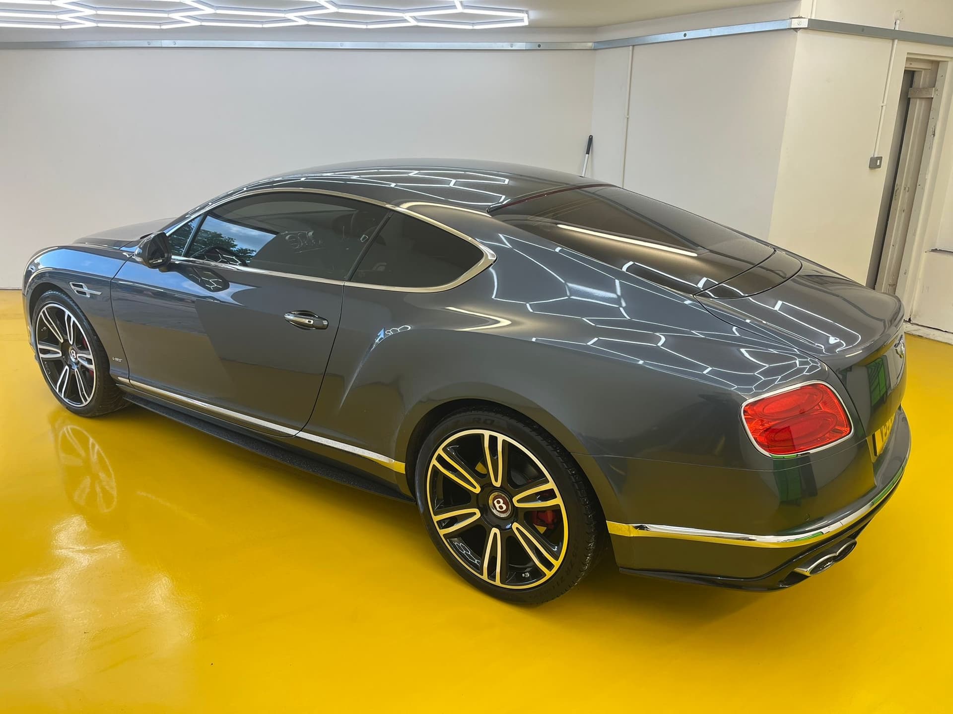 Luxury car being detailed - 1