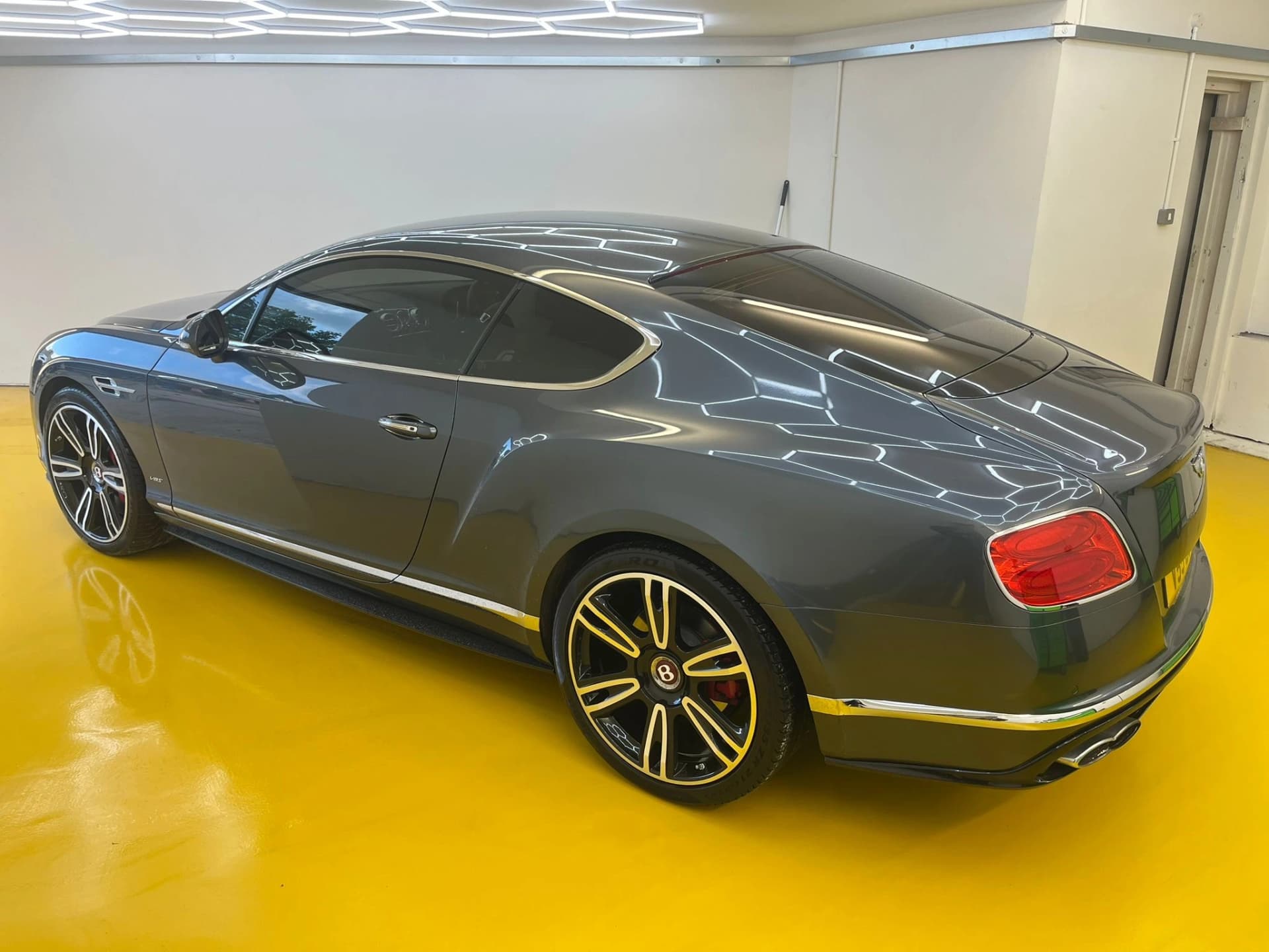 Luxury car being detailed
