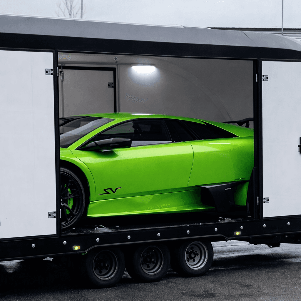 Enclosed car transport trailer